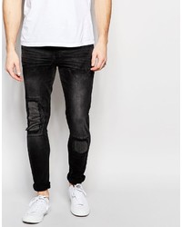 Asos Brand Super Skinny Jeans Rip With Patches In Washed Black
