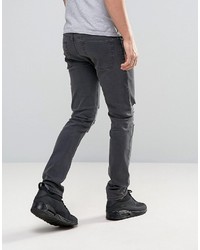 Asos Skinny Jeans With Heavy Rips In Washed Black