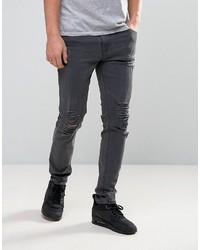 Asos Skinny Jeans With Heavy Rips In Washed Black