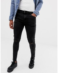 Bershka Super Skinny Jeans In Black Acid Wash With Knee Rips