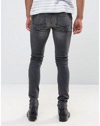 Asos Super Skinny Jeans With Distressing In Washed Black