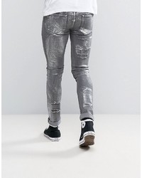 Asos Super Skinny Jeans With Rips In Metalic Sliver Coated Washed Black