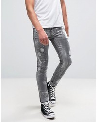 Asos Super Skinny Jeans With Rips In Metalic Sliver Coated Washed Black