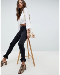 ASOS DESIGN Whitby Low Rise Skinny Jeans With Tulle Hem In Washed Black