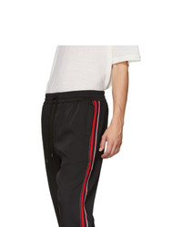 Cmmn Swdn Black And Red Buck Track Pants
