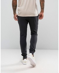 Asos Super Skinny Joggers With Knee Rips In Washed Black