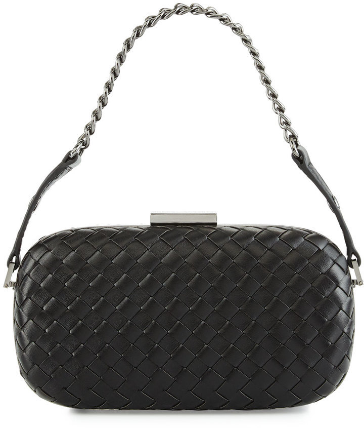 black woven clutch bag