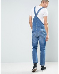 Asos Denim Overalls With Abrasions And Raw Hem In Mid Blue