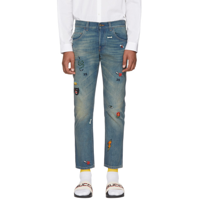 Gucci Blue Tapered Symbols Jeans, $1,200 | SSENSE | Lookastic