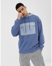 ASOS DESIGN Oversized Hoodie With Contrast Woven Pocket And Hood In Blue