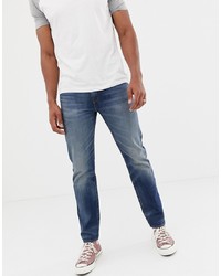 Levi's 502 Regular Tapered Fit Jeans In Mako Cool Warp Mid Wash