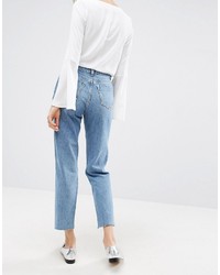 Asos Original Mom Jeans In Phoebe Mid Stonewash With Busts And Stepped Hem