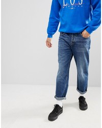 ASOS DESIGN Skater Jeans In Mid Wash Blue