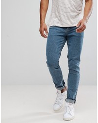 ASOS DESIGN Skinny Jeans In Flat Mid Blue