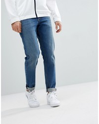 ASOS DESIGN Slim Jeans In Mid Wash Blue