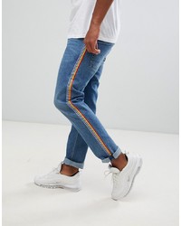 ASOS DESIGN Slim Jeans In Mid Wash Blue With Stripe