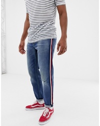 ASOS DESIGN Tapered Jeans In Mid Wash Blue With Red
