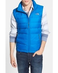 Blue Gilets by The North Face | Lookastic