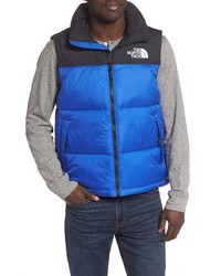Blue Gilets by The North Face | Lookastic