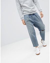 ASOS DESIGN Barrel Jeans In Mid Wash Blue With Rips
