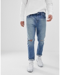 ASOS DESIGN Carrot Fit Jeans In Light Wash Blue With Heavy Rips