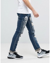 Reason Extreme Distressed Slim Jeans With Paint Splat And Skull Stencil