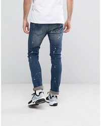 Reason Extreme Distressed Slim Jeans With Paint Splat And Skull Stencil