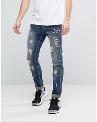 Reason Extreme Distressed Slim Jeans With Paint Splat And Skull Stencil