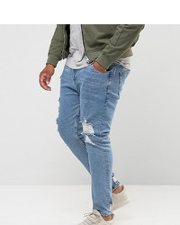 ASOS DESIGN Plus Skinny Jeans In Light Wash Blue Vintage With Heavy Rips And Repair
