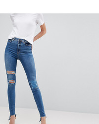 Asos Tall Asos Design Tall Ridley High Waist Skinny Jeans In Extreme Mid Wash With Busted Knee And Rip Repair Detail