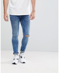 ASOS DESIGN Asos Extreme Super Skinny Jeans In Mid Wash Vintage With Knee Rips