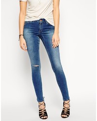 Asos Collection Lisbon Skinny Mid Rise Jeans In Worker Mid Wash Blue With Ripped Knee