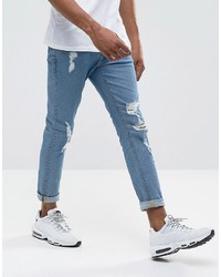 ASOS DESIGN Skinny Jeans In Mid Wash With Heavy Rips