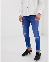ASOS DESIGN Super Skinny Jeans In Bright Blue Wash With Rips