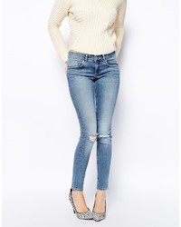 Asos Whitby Low Rise Skinny Jeans In Columbia Light Wash Blue With Ripped Knees