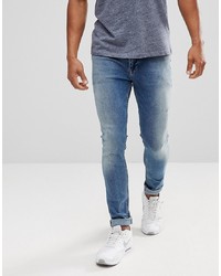 ASOS DESIGN Asos Extreme Super Skinny Jeans In Mid Wash Vintage With Abrasions