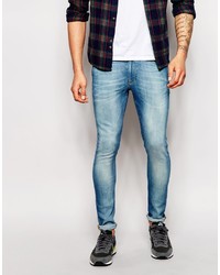 Asos Brand Extreme Super Skinny Jeans In Mid Wash