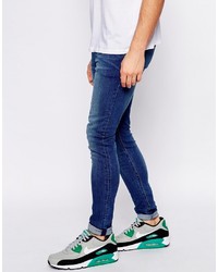 Asos Brand Extreme Super Skinny Jeans With Rip And Repair