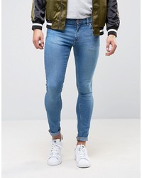 ASOS DESIGN Extreme Super Skinny Jeans In Mid Blue