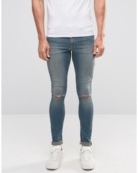 Asos Extreme Super Skinny Jeans With Knee Rips In Mid Wash