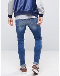Asos Extreme Super Skinny Jeans With Rips In Mid Wash