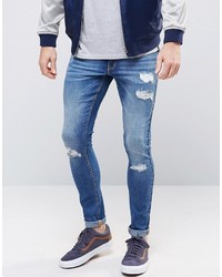 Asos Extreme Super Skinny Jeans With Rips In Mid Wash