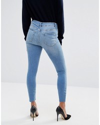 Asos Petite Petite Ridley Skinny Jeans In Akira Bright Wash With Stepped Hem