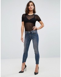 Asos Petite Petite Whitby Skinny Low Rise Jeans In Dita Tinted Mid Wash With Reverse Stepped Hem