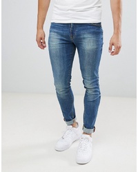 ASOS DESIGN Skinny Jeans In Mid Blue Wash