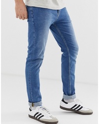 ASOS DESIGN Skinny Jeans In Mid Wash
