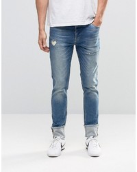 Asos Skinny Jeans With Turn Ups And Rips