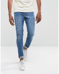 ASOS DESIGN Super Skinny Jeans In 125oz Mid Wash Blue