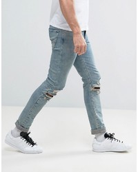 Asos Super Skinny Jeans With Knee Zip Rips In Dusty Bleach
