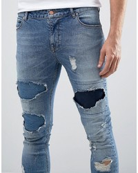 Asos Super Skinny Jeans With Rips In Mid Wash
